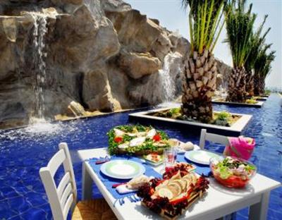 фото отеля Kinetta Beach Hotel