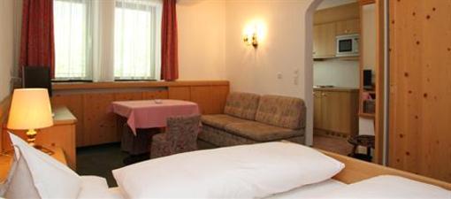 фото отеля Appartement Alpenland