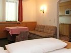 фото отеля Appartement Alpenland