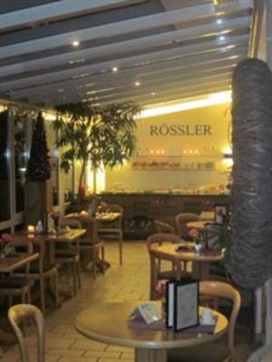 фото отеля Cafe Rossler Gastehaus Brannenburg