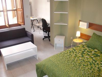 фото отеля Apartamentos Suites & Homes