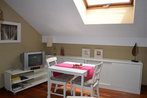 фото отеля Apartamentos Suites & Homes
