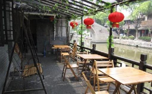 фото отеля Yuan's Inn Xitang