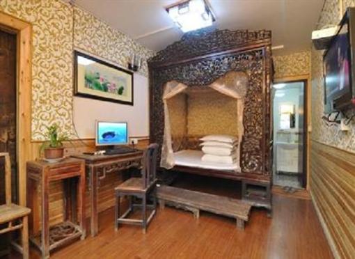 фото отеля Yuan's Inn Xitang