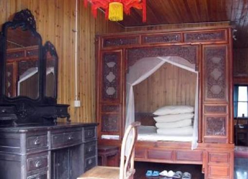 фото отеля Yuan's Inn Xitang