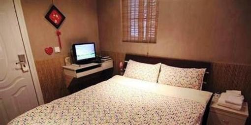 фото отеля Youzou Riyue Family Hotel