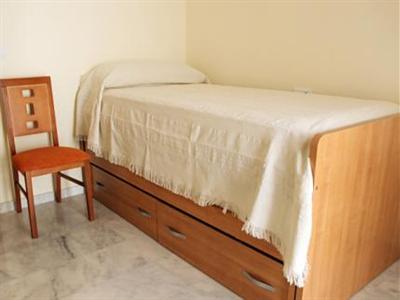 фото отеля Apartamentos Turisticos Puerta Nueva