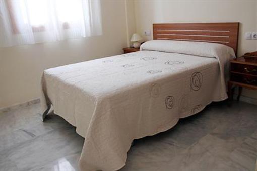 фото отеля Apartamentos Turisticos Puerta Nueva