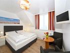 фото отеля Hotel Meerzeit Haffkrug
