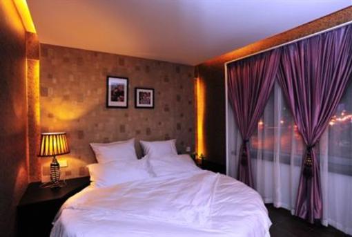 фото отеля Yusu Holiday Inn