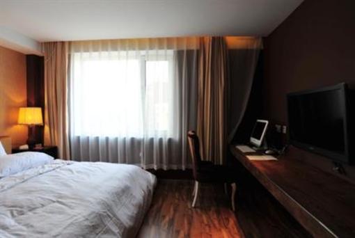 фото отеля Yusu Holiday Inn