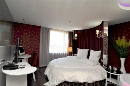 фото отеля Yusu Holiday Inn
