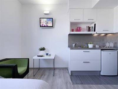 фото отеля Residencia Melon District Marina