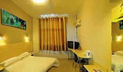 фото отеля Zhongzhou Inn Zhoukou Bayi Road