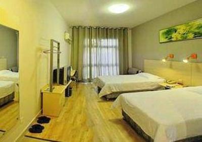 фото отеля Zhongzhou Inn Zhoukou Bayi Road