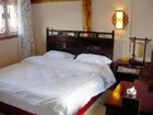 фото отеля Lijiang Hollywood Inn