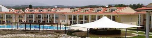 фото отеля Oasis Holiday Bungalows
