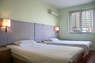 фото отеля Qingdao Renjia Business Hotel