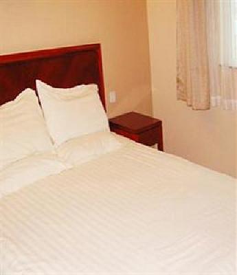 фото отеля Green Tree Inn (Zhenjiang Zhongshan West Road)