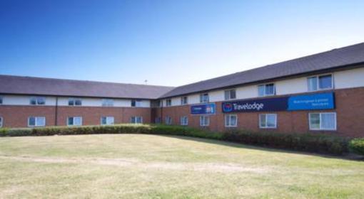 фото отеля Travelodge Warrington Lymm Services