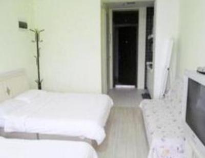 фото отеля Dalian Yi Fang Leisure Apartment