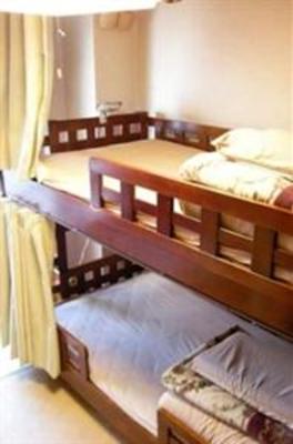 фото отеля J-Hoppers Hiroshima Guesthouse