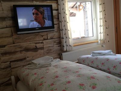 фото отеля Hotel Almrausch Reit im Winkl