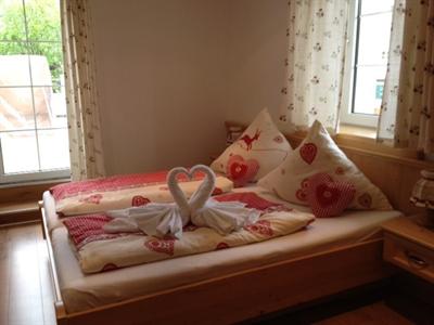 фото отеля Hotel Almrausch Reit im Winkl