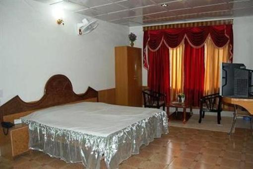 фото отеля Hotel Sangam Kullu