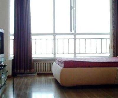 фото отеля Fu Jia Xintiandi Apartment Hotel Dalian