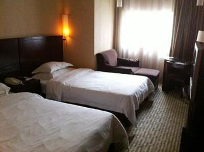 фото отеля Paco Business Hotel Yuancun Guangzhou