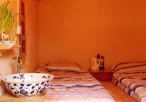 фото отеля Shaxi Horse Pen 46 Youth Hostel