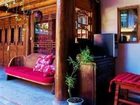 фото отеля Lijiang Beiweisanshidu Inn