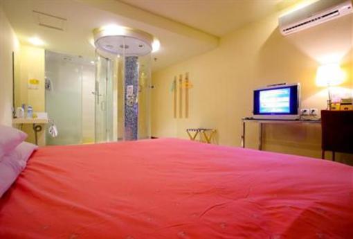 фото отеля Home Inn Zhongshan Bridge
