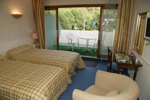 фото отеля Touring Hotel Saint-Leonard-des-Bois