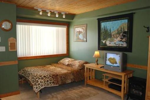 фото отеля Outlaws Inn by Apex Accommodations