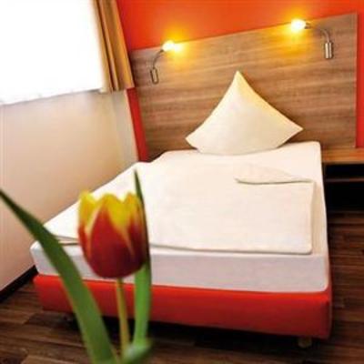 фото отеля Orange Hotel und Apartments