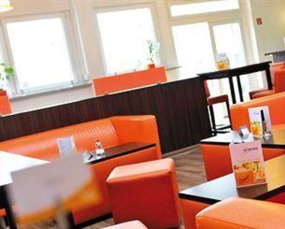 фото отеля Orange Hotel und Apartments