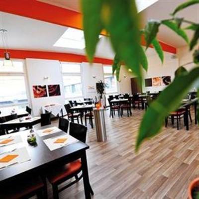 фото отеля Orange Hotel und Apartments