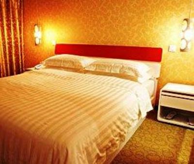 фото отеля Deyang Jingcheng Home Hotel