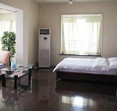 фото отеля Juan Shu Tang Family Apartment Chongqing