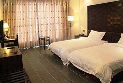 фото отеля Yading Shanshui Holiday Hotel