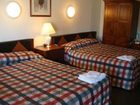 фото отеля Economy Motel Inn & Suites