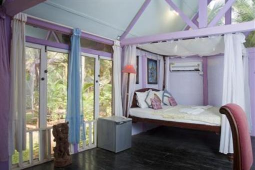 фото отеля Leela Cottages