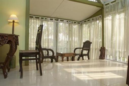 фото отеля Leela Cottages