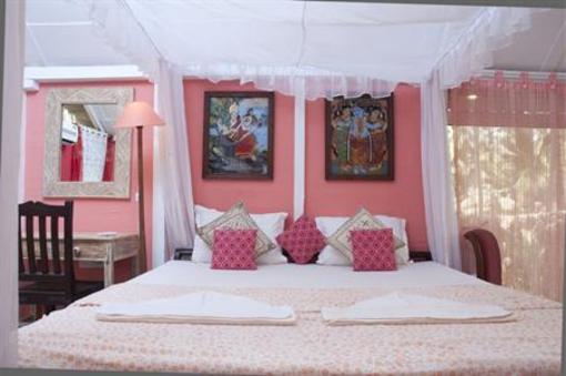 фото отеля Leela Cottages