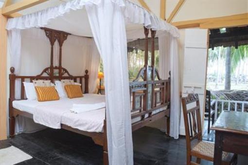 фото отеля Leela Cottages