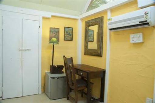 фото отеля Leela Cottages