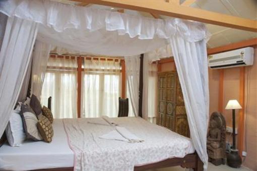 фото отеля Leela Cottages
