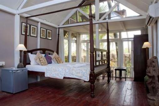 фото отеля Leela Cottages